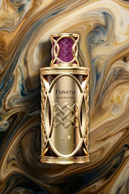 Gold Havena perfume bottle on a swirling marble background