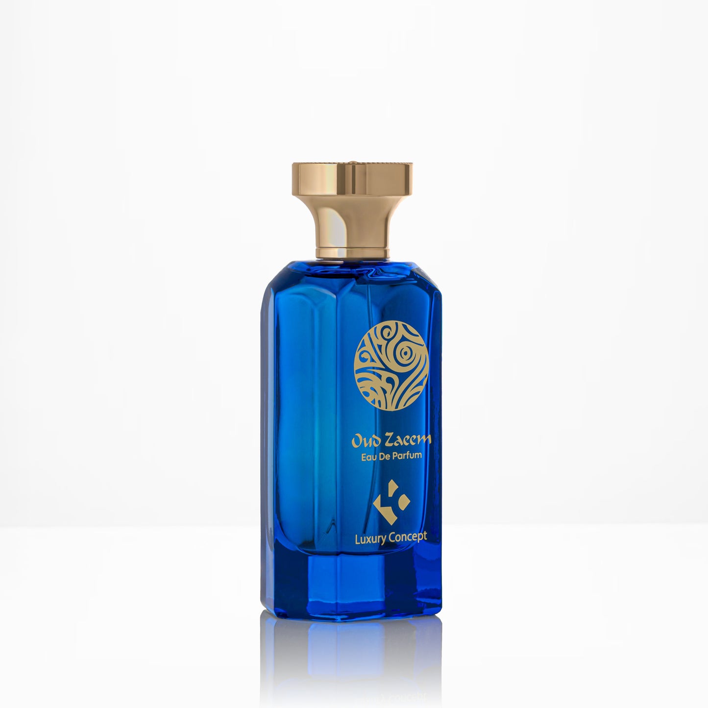 Angled view of Oud Zaeem luxury oud eau de parfum bottle with blue transparent glass and elegant gold detailing