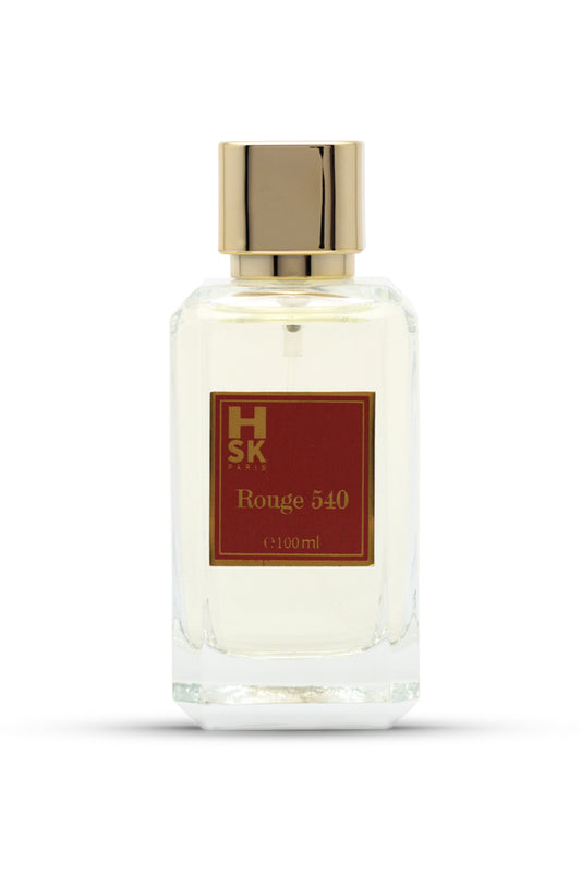 Oriental amber woody perfume from luxury cocnept. A clear glass bottle of ROUGE 540 EAU DE PARFUM with a gold-colored cap and a red label displaying the product name.
