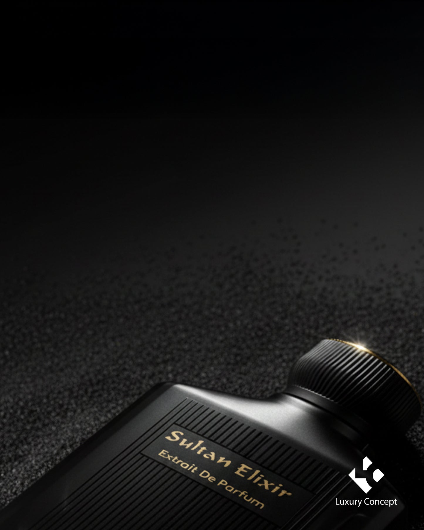 Close up of Sultan Elixir extrait de parfum bottle with crown inspired gold cap and refined matte black luxury design