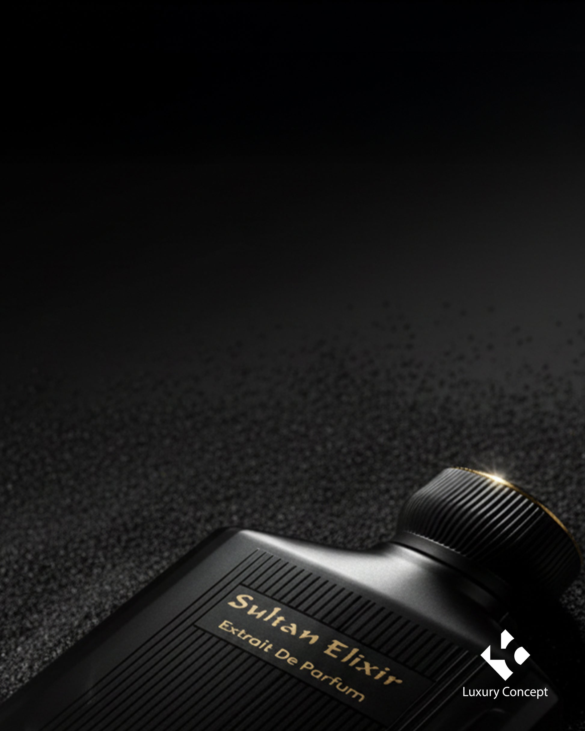 Close up of Sultan Elixir extrait de parfum bottle with crown inspired gold cap and refined matte black luxury design