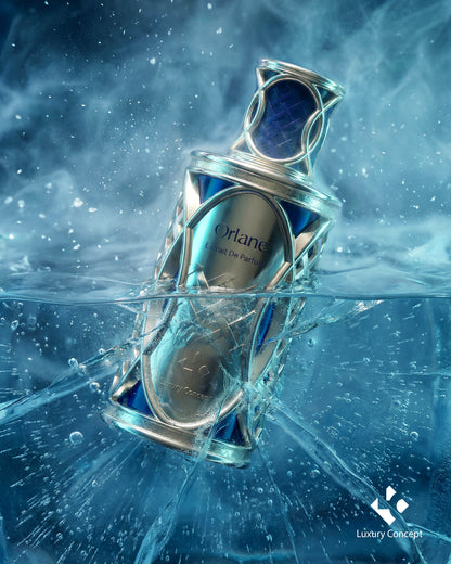 Orlane neptune inspired gold and deep blue luxury perfume bottle with fluid dreamlike aesthetic and soft musk fragrance by Luxury Concept